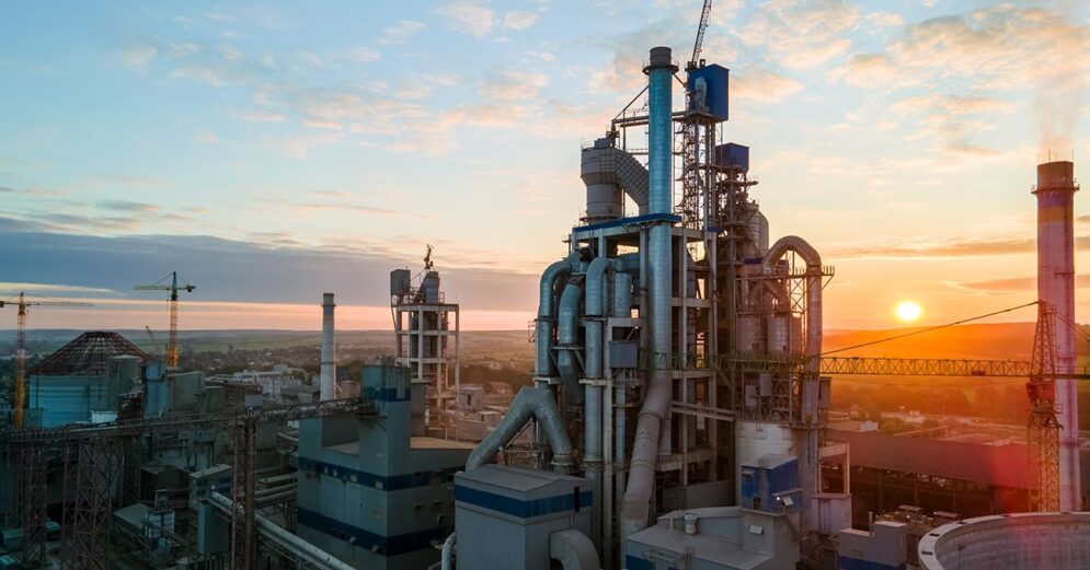 aerial-view-cement-factory-with-high-concrete-plant-structure-tower-crane-industrial-production-area-manufacture-global-industry-concept-995x521-1